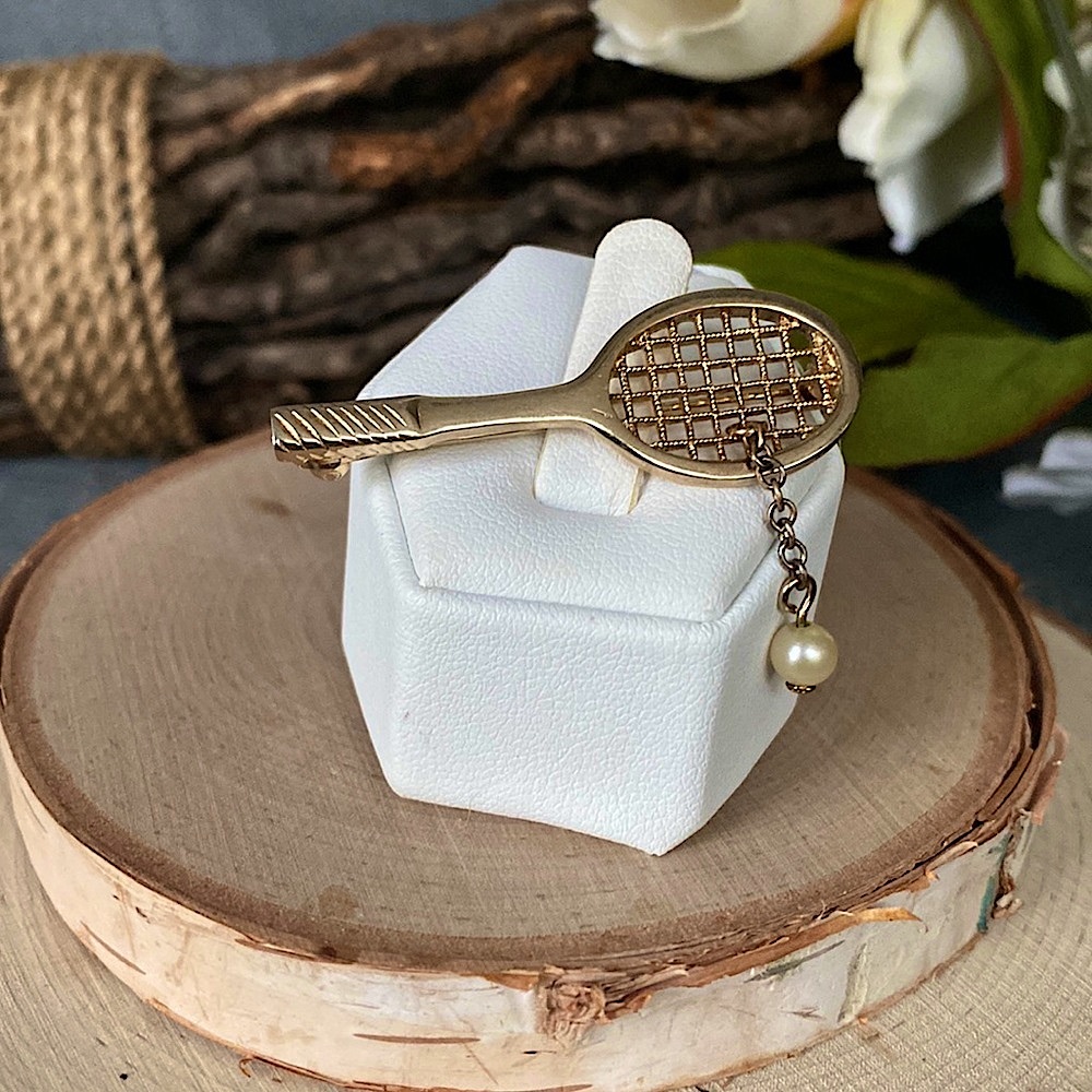 VTG- ‘70s Avon "Love Match" tennis rack brooch w/ a dangling pearl tennis ball